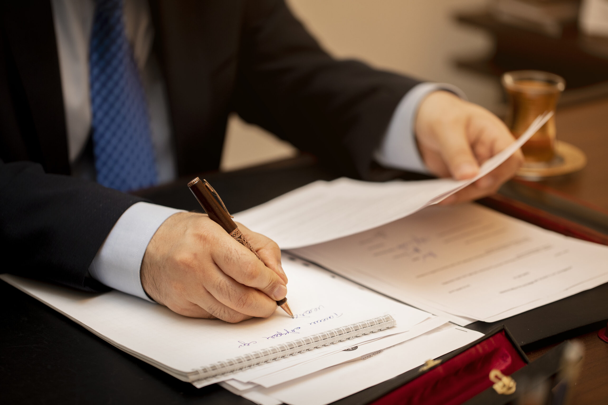 Client reviewing and signing service documents